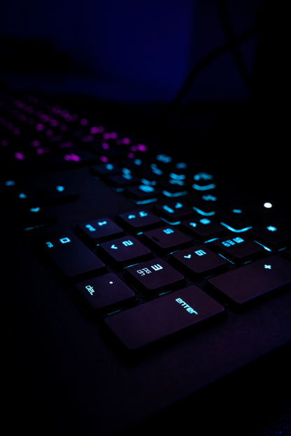 Atlas keyboard resting on blue fabric