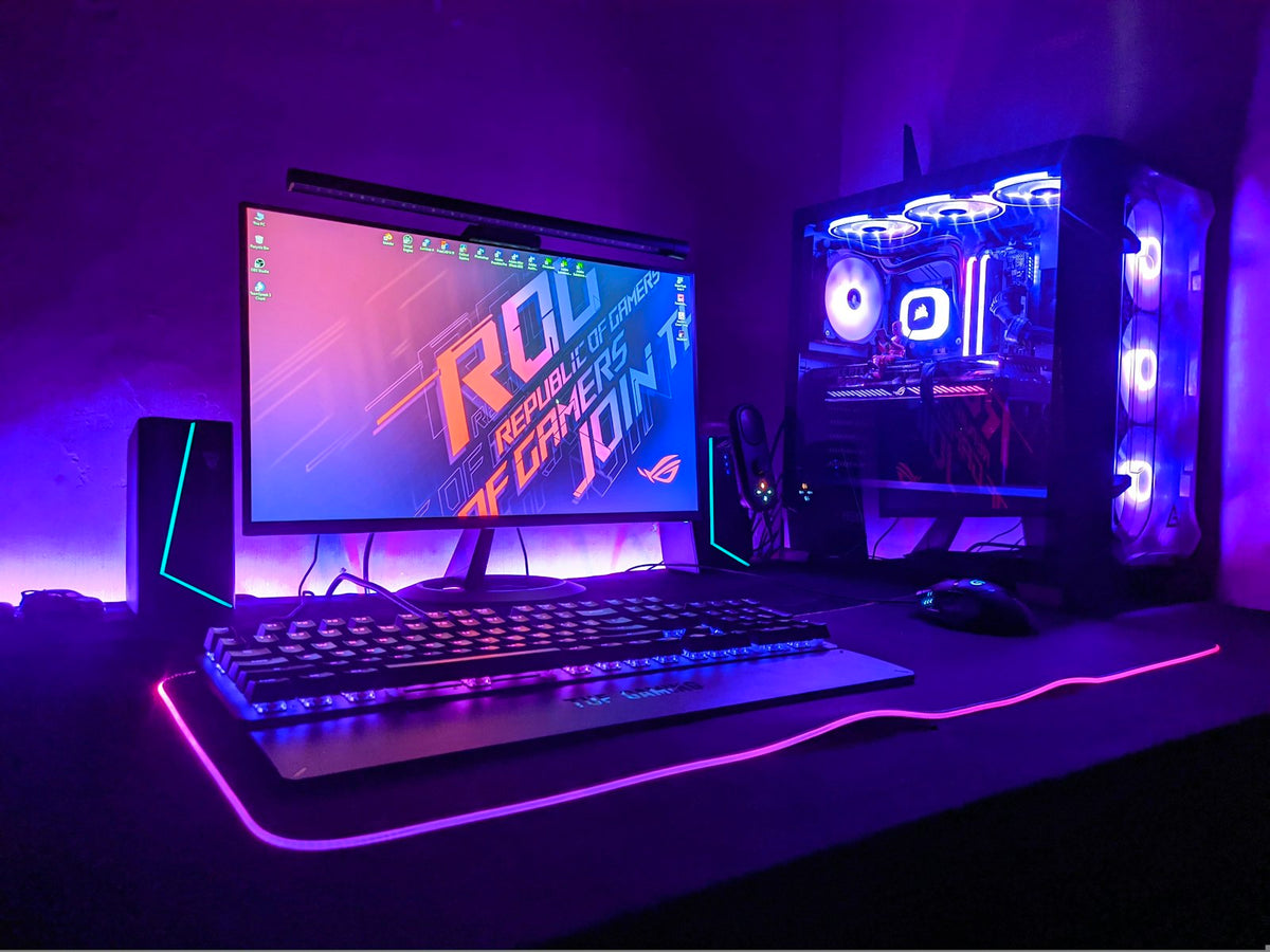 Vortex Pro in a gaming setup with purple ambient light